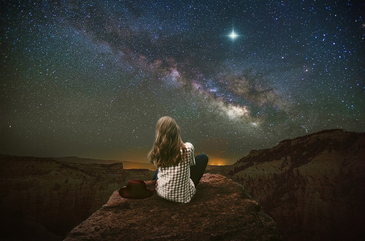 Flight Attendant gazing at the universe